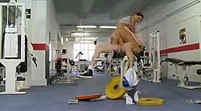 busty brunette having a sex workout in the gym