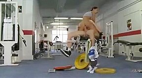 busty brunette having a sex workout in the gym