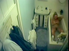 in bathroom caught milf in bathtube