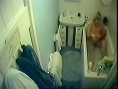 in bathroom caught milf in bathtube