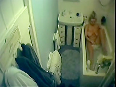 in bathroom caught milf in bathtube